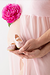 Babybauch Baby Schuhe Hand